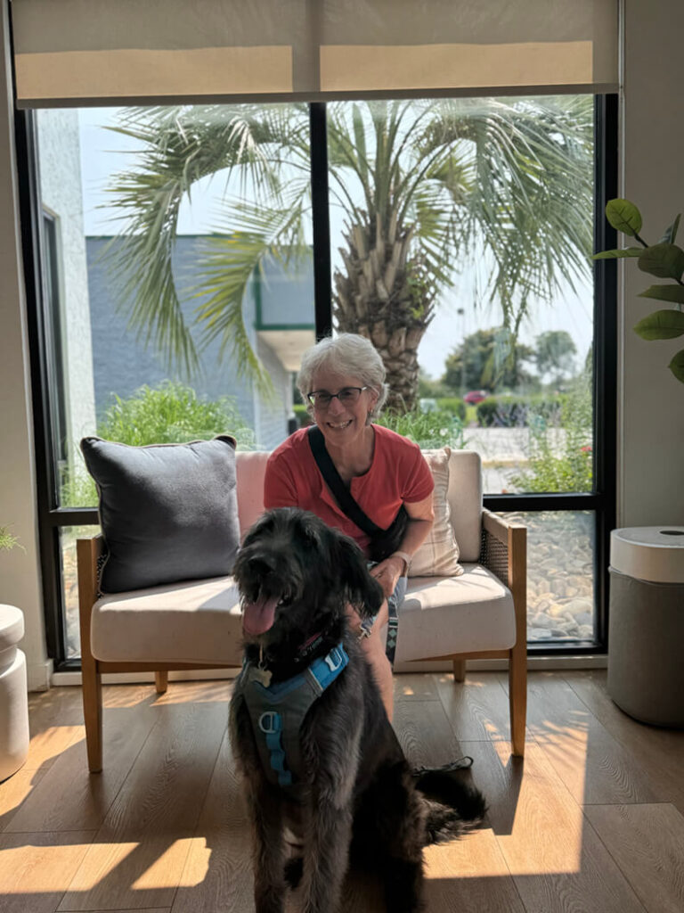 This lady and Cooper look very happy to be together.