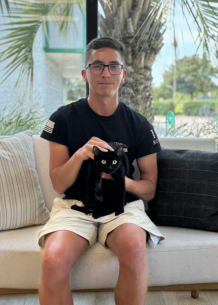 September 2025 adoption of Punky a black cat with big gold eyes