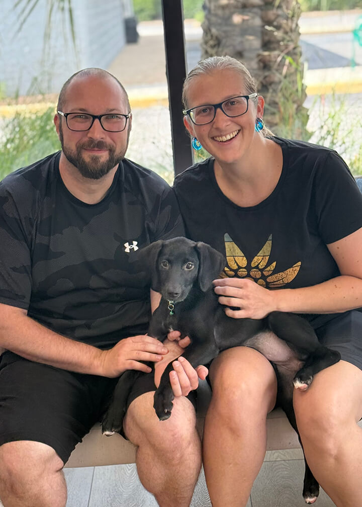 September 2025 adoption of Sleepy a black puppy