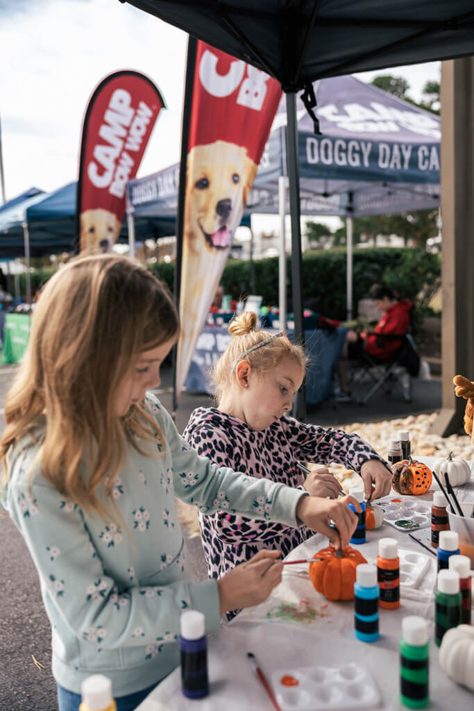 The kids painted pumpkins at one of the booths