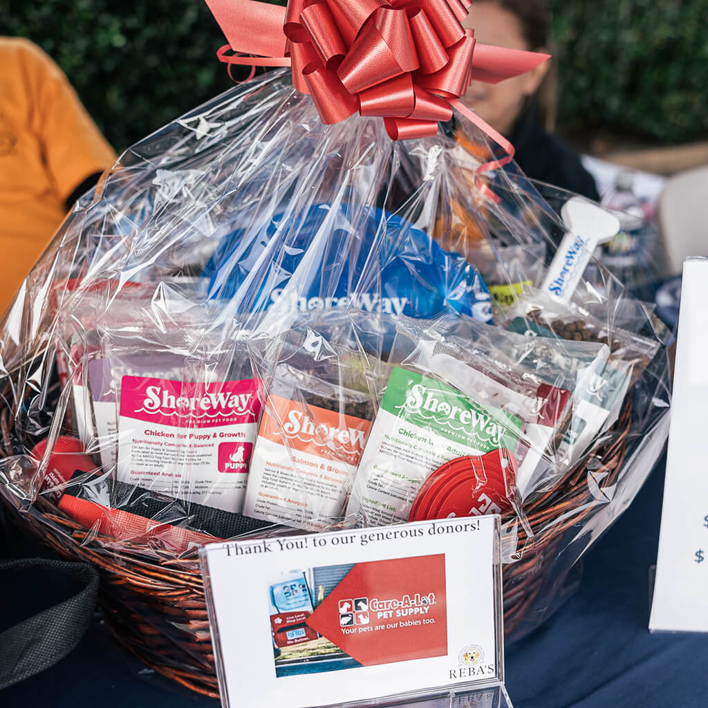 Gift baskets were raffled off at the event. This dog themed basket was donated by Care-A-Lot Pet Supply.