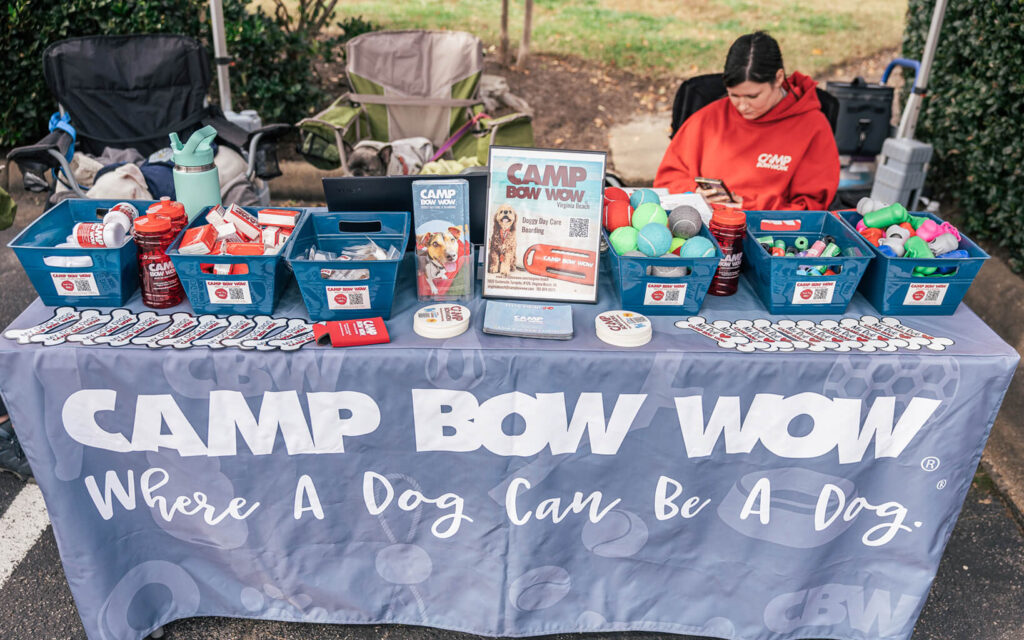 Camp Bow Wow Virginia Beach offered various treats and giveaways. They offer doggie day care.