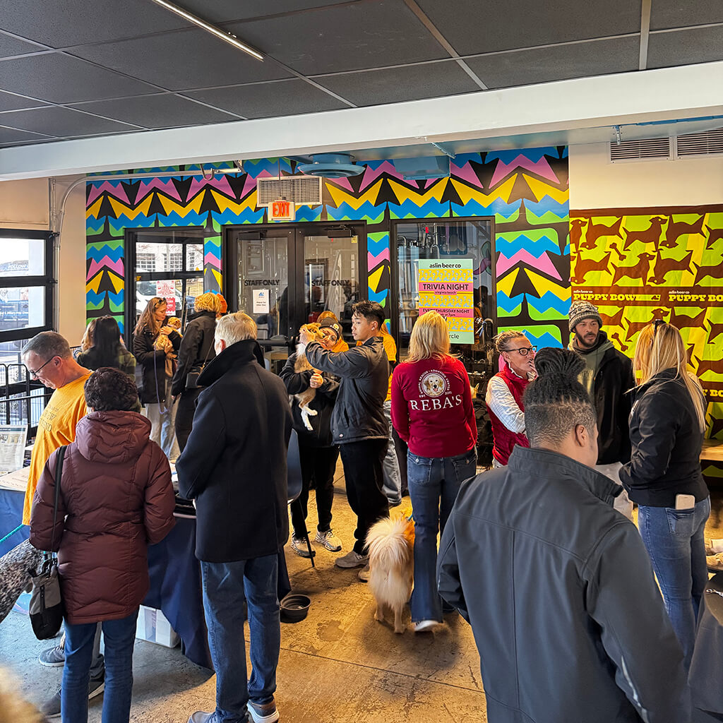 Guests gather around the entrance at the Puppy Bowl