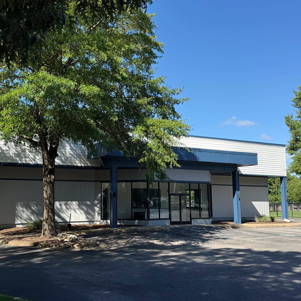Progress picture: Exterior of building is now painted Reba's blue.